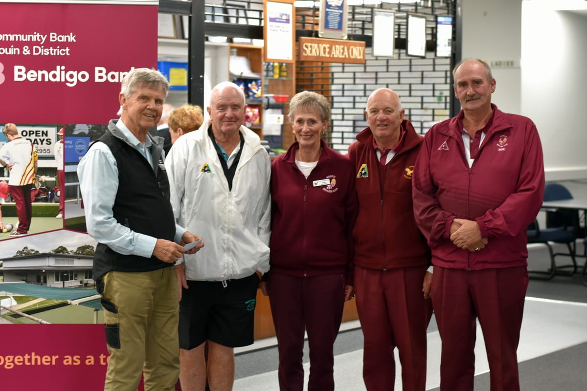 Left: At the presentation of third place at Diggers Day are (from left) Community Bank Drouin and District representative Sean Walsh and Drouin bowlers Geoff Bailey, Jan Aubrey, Graeme Aubrey and Ron Westrup.Below: Drouin/Warragul RSL Bowling Club president Wayne Walsh (left) and past president Col Jeffrey take a moment to reflect on Diggers Day.