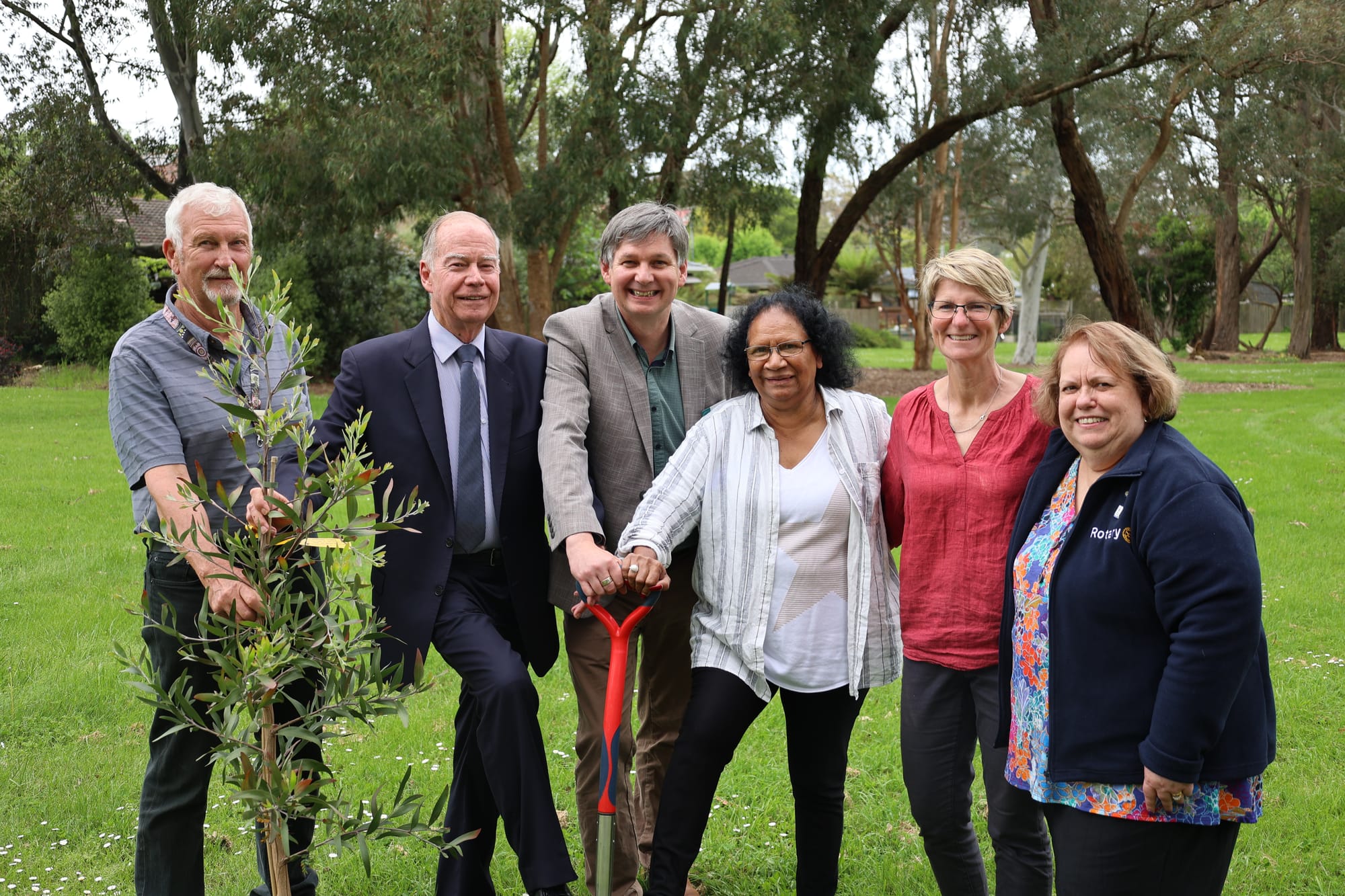 NOVEMBER: Planting the first tree in the indigenous garden are (from left) Cr Peter Kostos, Member for Monash Russell Broadbent, mayor Michael Leaney, artist Dr Auntie Eileen Harrison Artist, landscape designer Prue Metcalfe and Warragul Rotary Club president Teresa Mitchell.