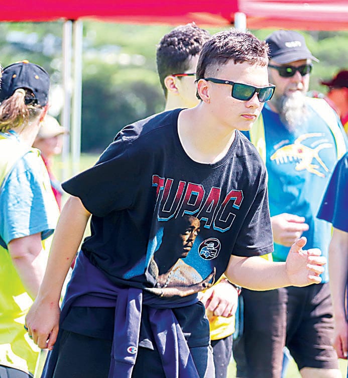 Josh prepares for his start in the senior school 400 metre race.