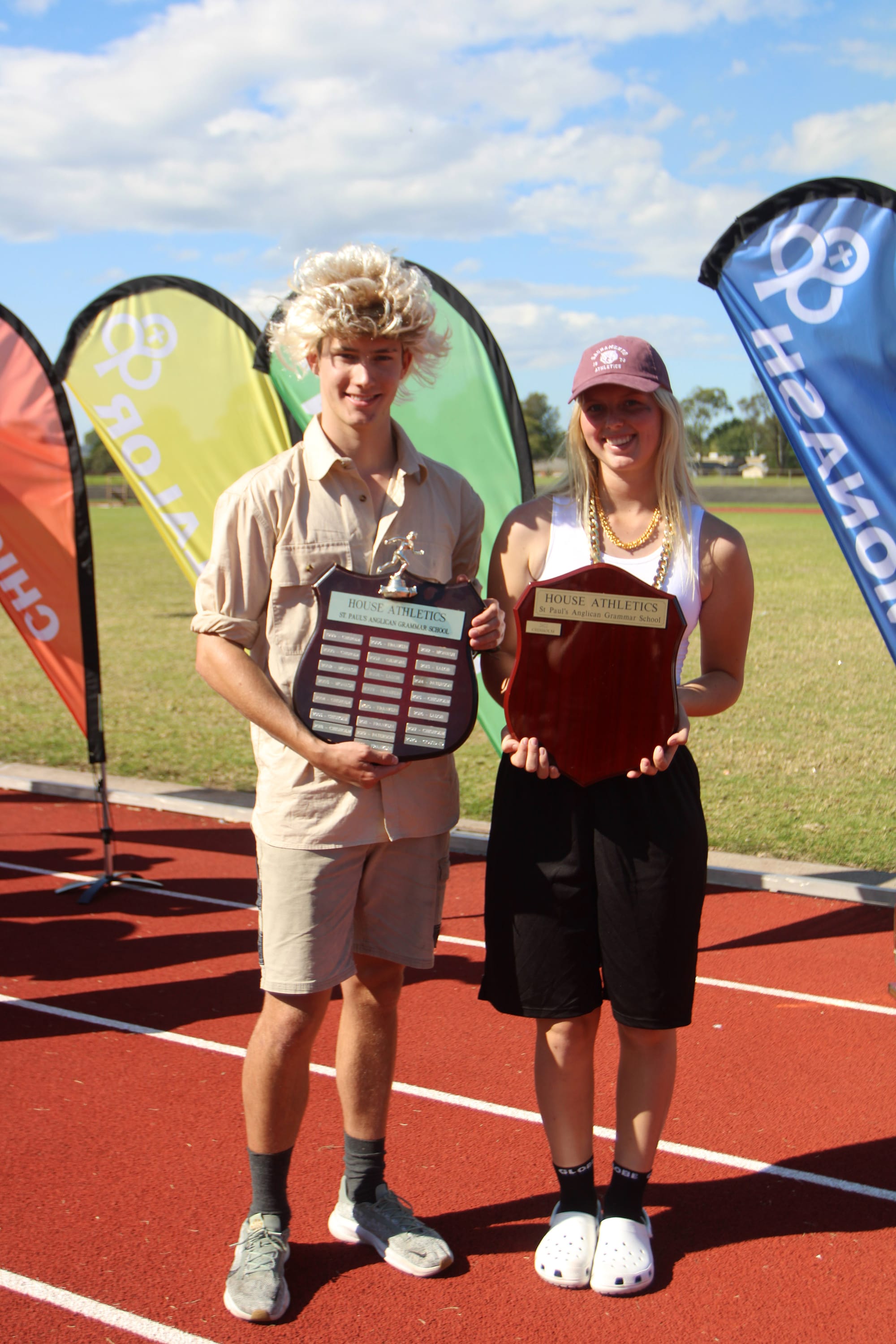 Paterson house captains Quinn Carmichael and Tahlia Pursell present the overall championship shield.