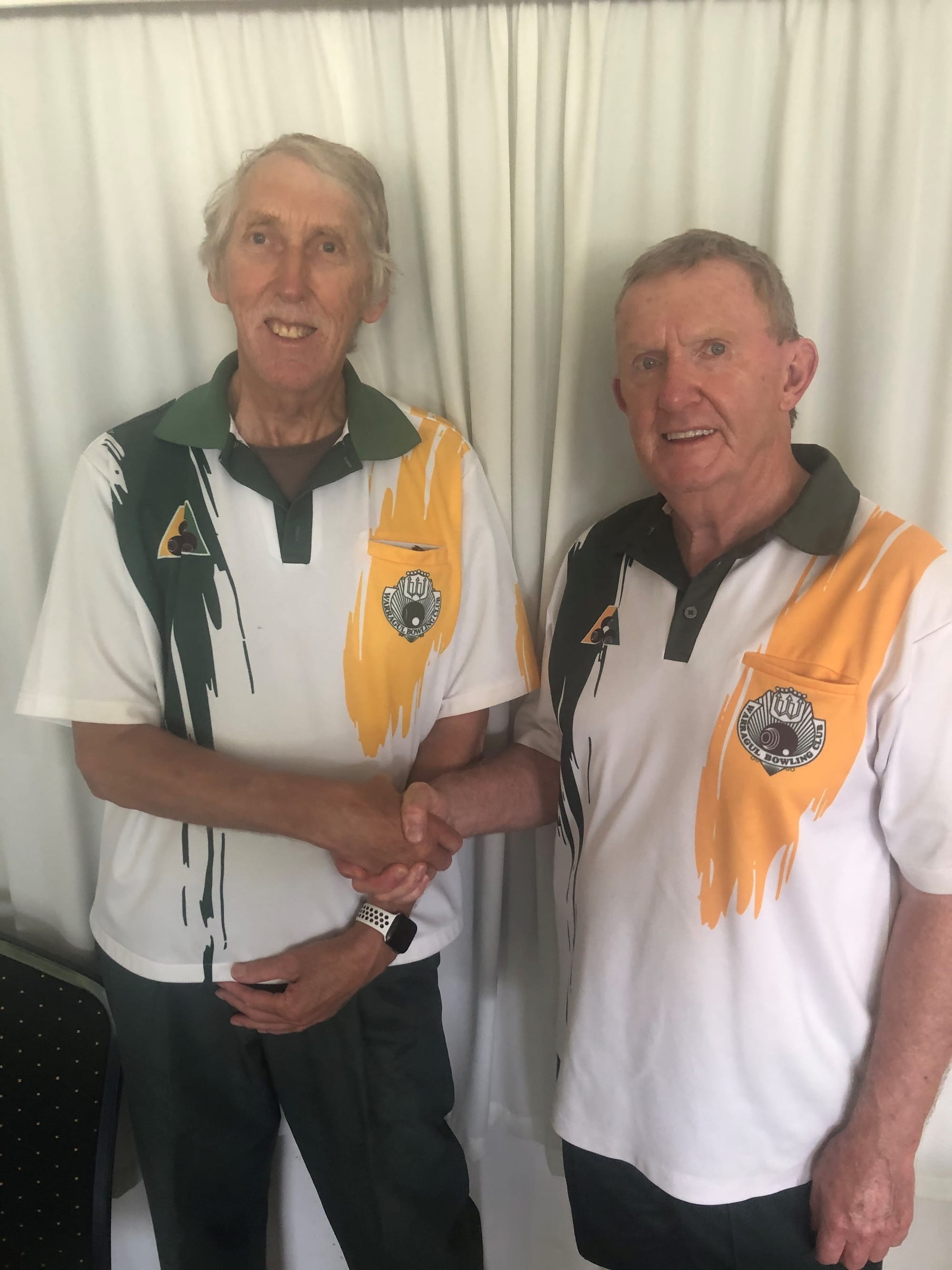 Warragul Bowling Club men's B grade champion Russ Carrick (right) with runner-up Greg Mitchell.