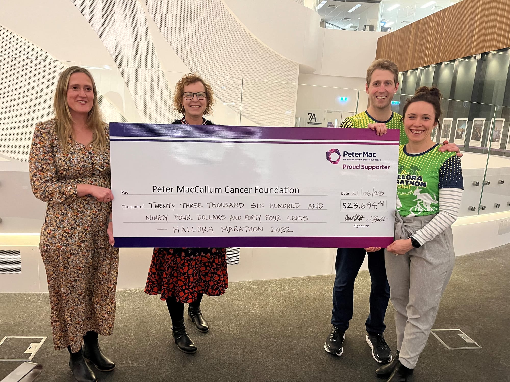 Dan (second right) and Laura Pratt (right) present the cheque from last year's event to Sarah Flanagan and Sonya Kennedy from the Peter MacCallum Cancer Centre.