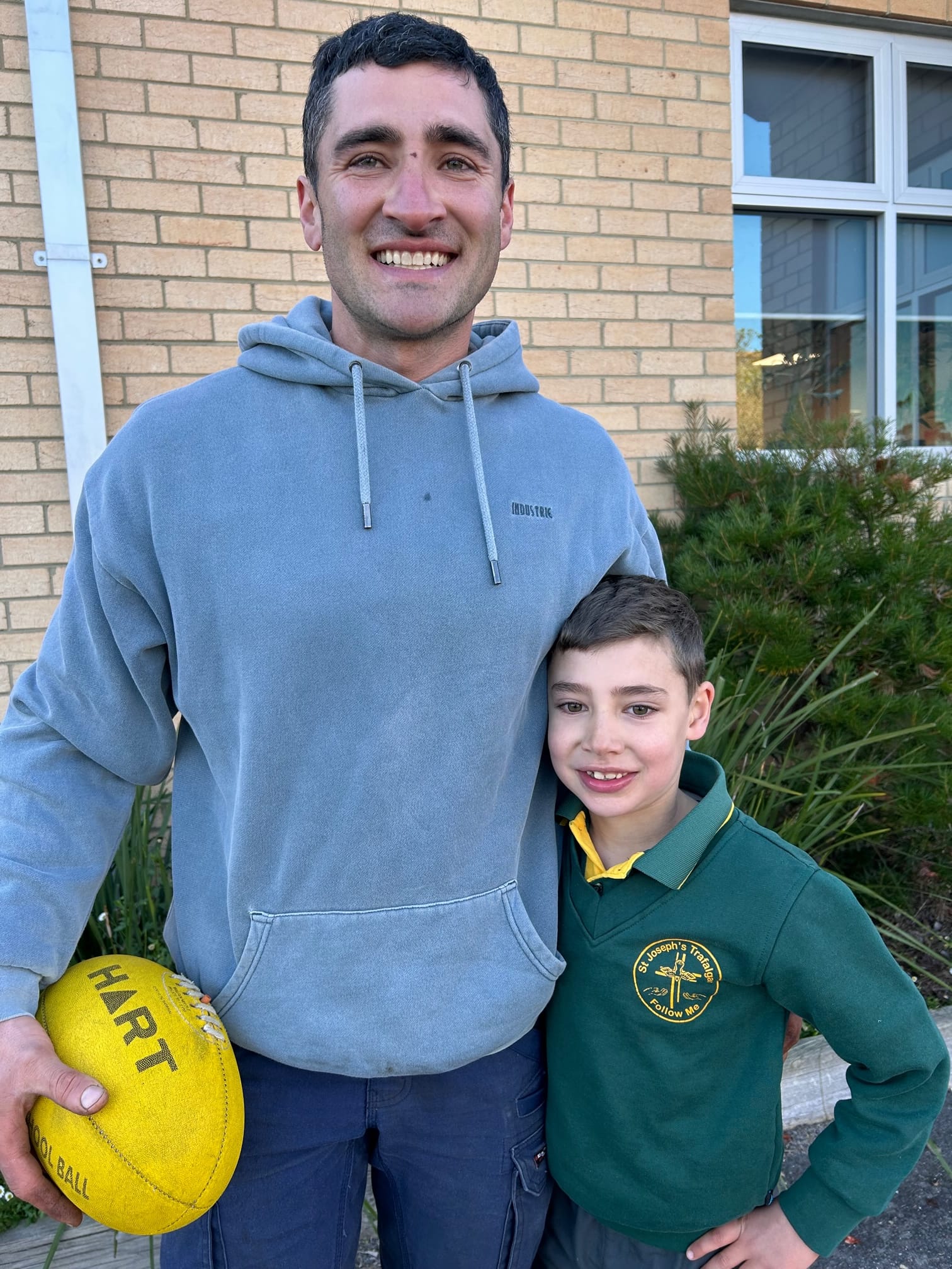 Vito and Sam Castello play some football together during the special activities.