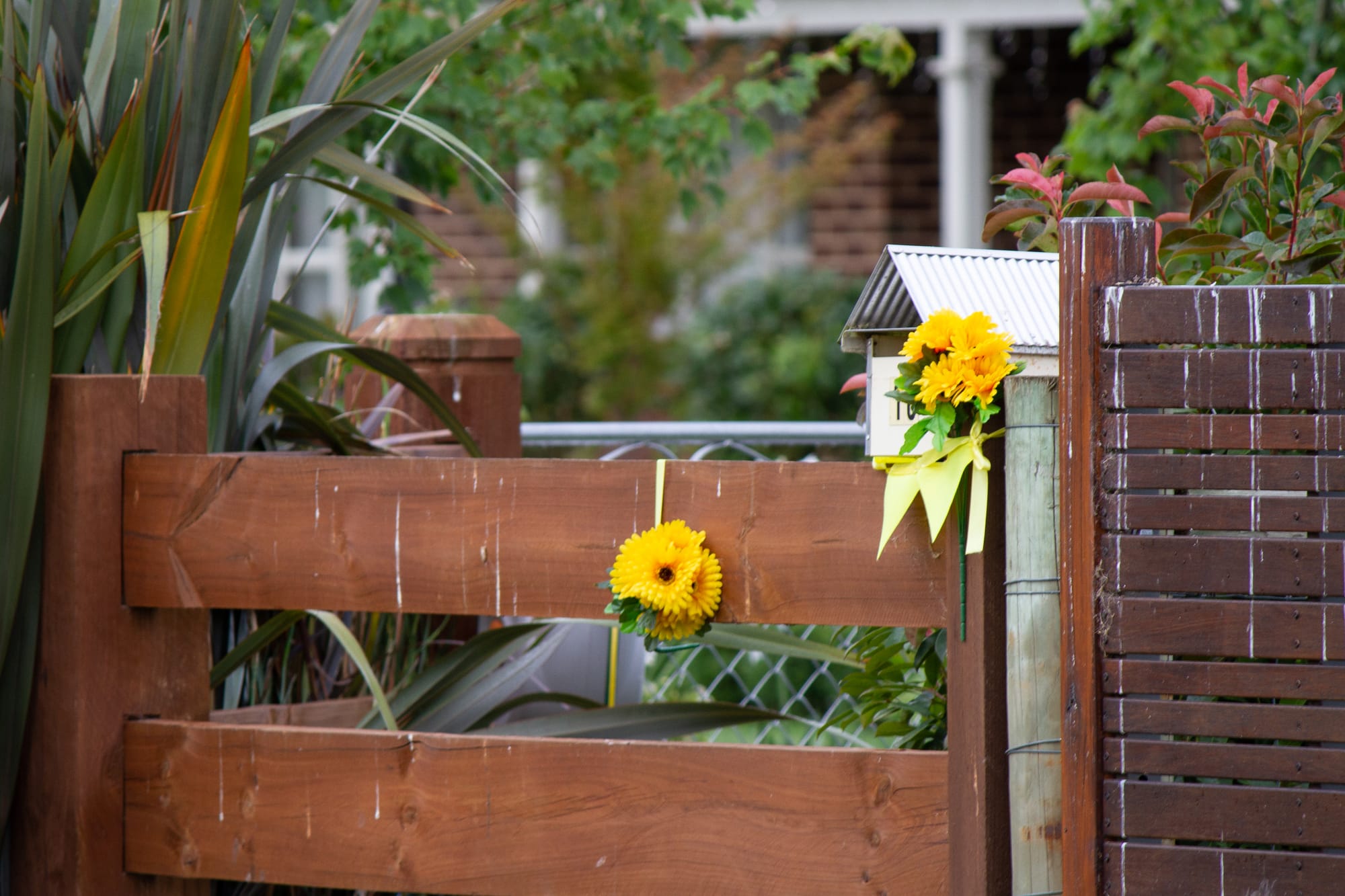 Letterbox tributes to postie