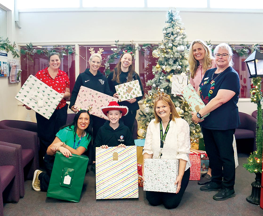 Voyage give gifts to hospital patients for Christmas