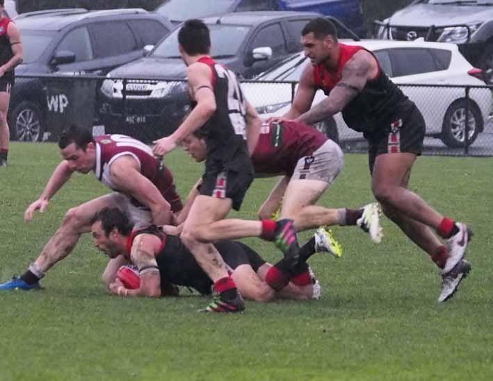 Tight footy battles post image