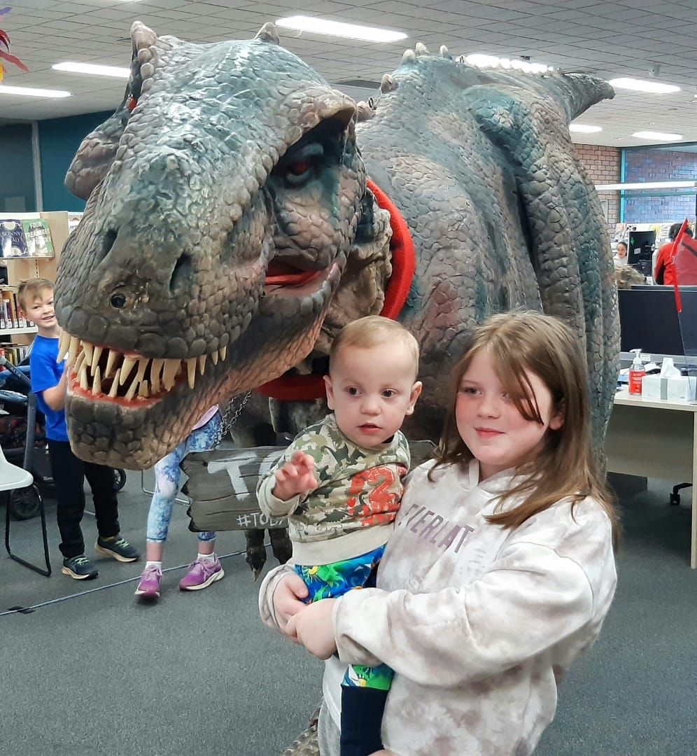 Dinosaurs roar at library post image