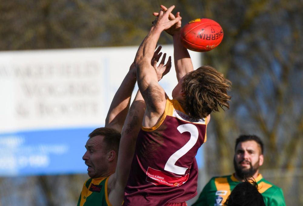 Improved Hawks fall short against Eagles post image