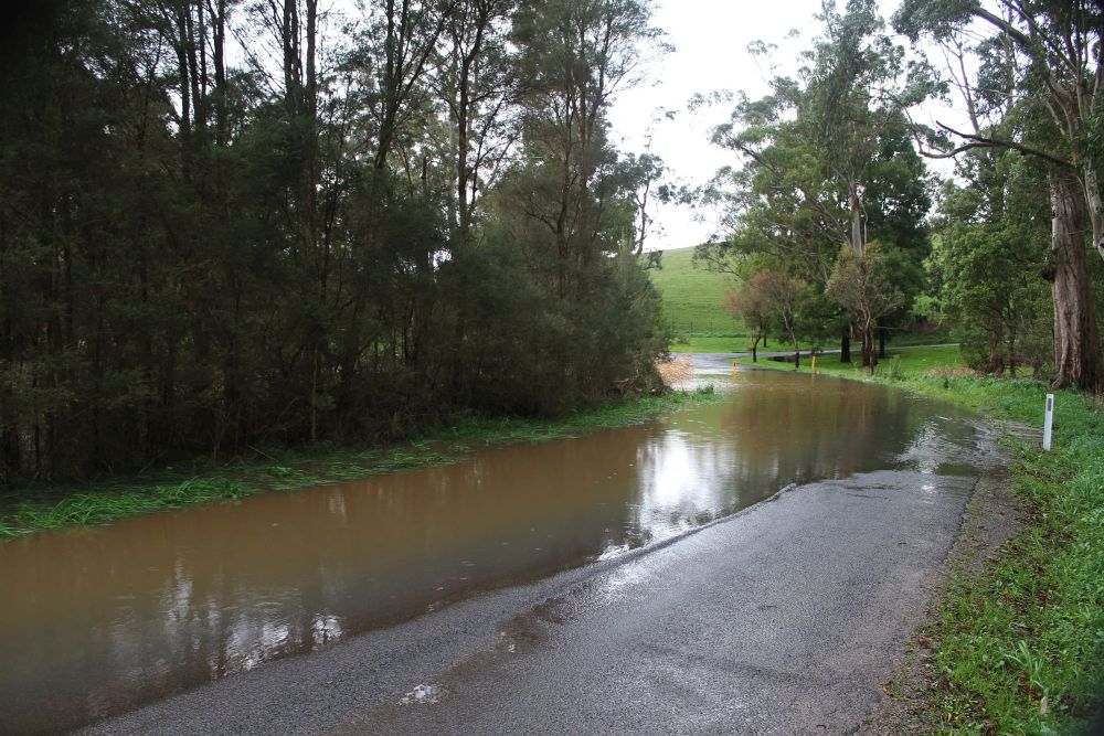 Flood waters close roads post image
