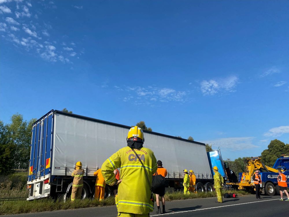 Traffic stopped after semi-trailers collide post image