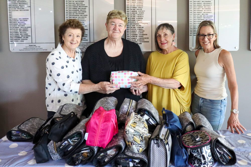 Golfers team up for toiletries charity drive post image