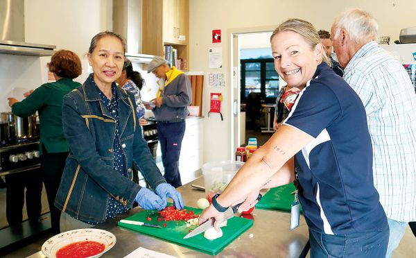 Cooking up a feast at community house post image