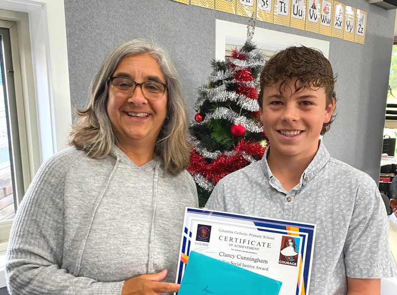 Clancy awarded at Columba post image