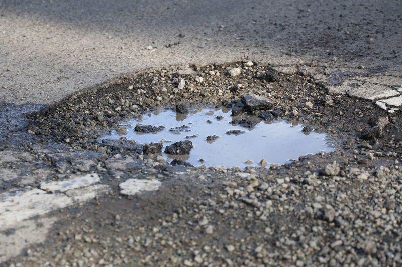 Focus on potholes, not speed post image