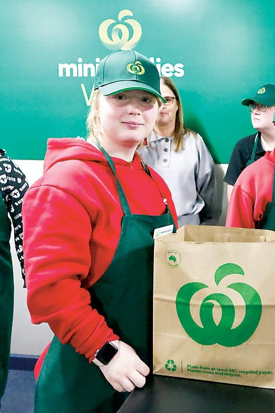 Students learn at mini supermarket post image