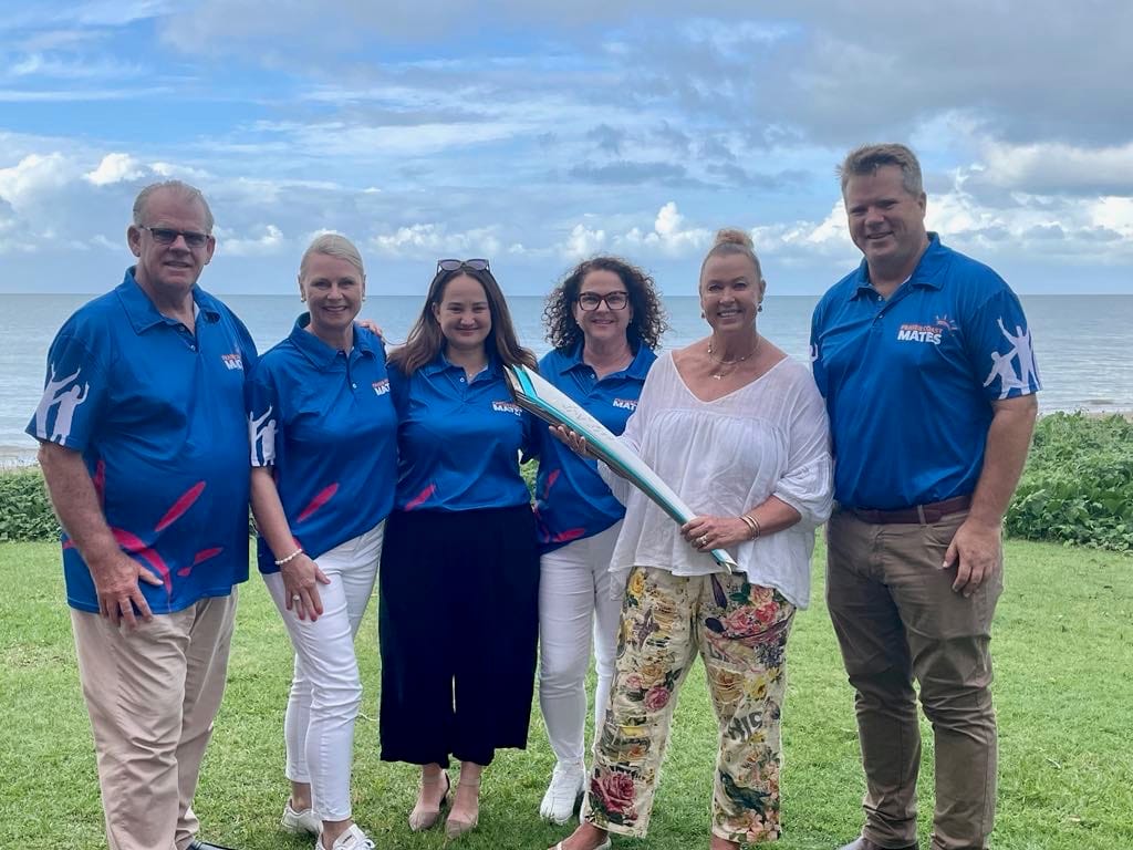 Lisa Curry gives Olympic flame to Fraser Coast Mates