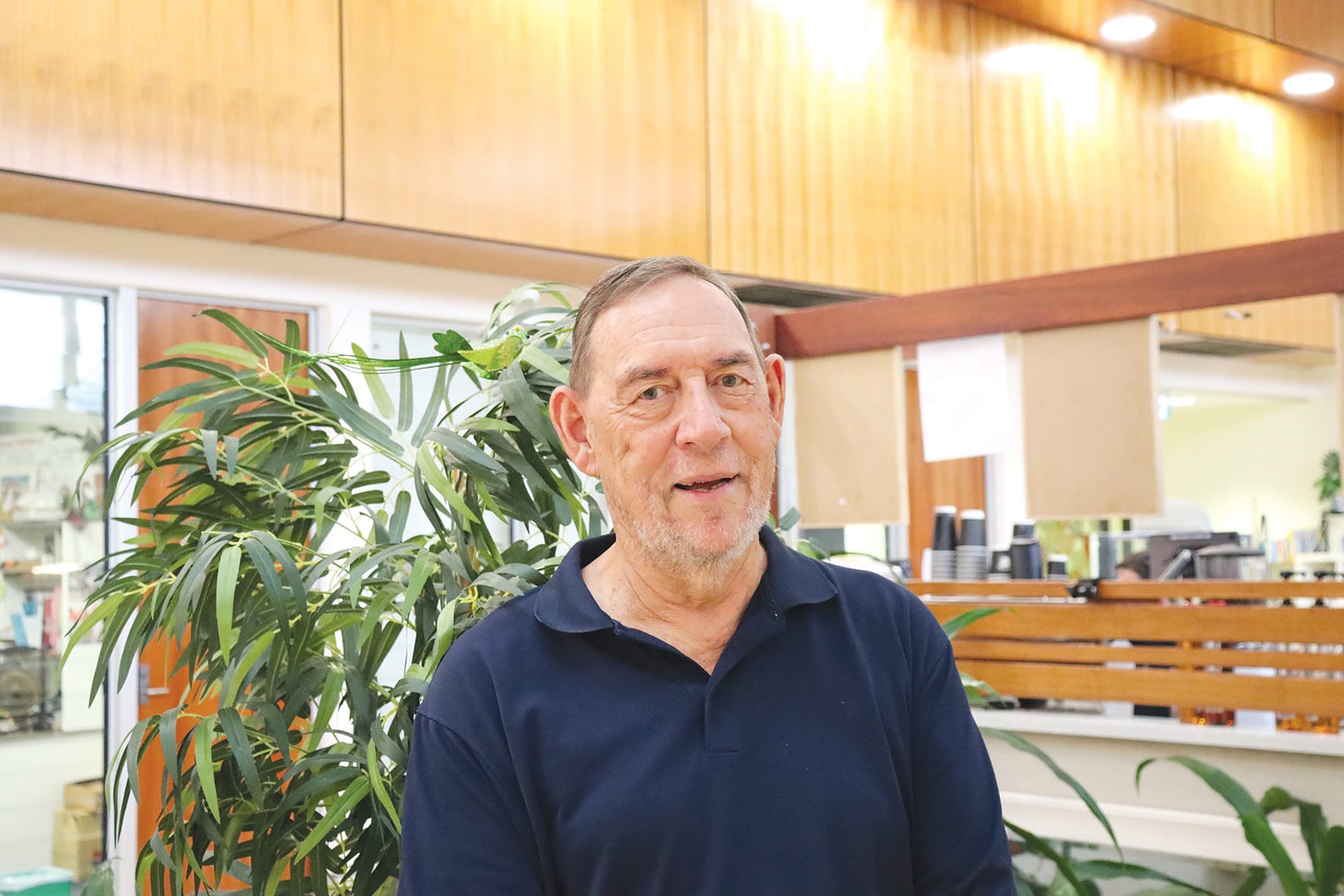 Senior volunteer mentoring the youth