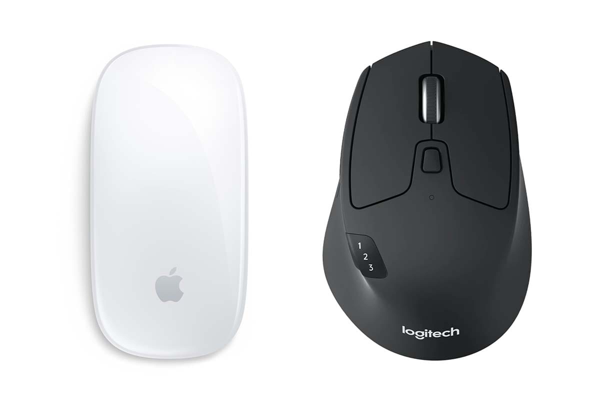 Top-view photos of Apple's Magic Mouse and Logitech's M720 mouse, side by side. Magic Mouse looks like a low-slung, featureless, geometric curve. M720 is curved like the inside of a hand, and is studded with tactile buttons and a scroll wheel..