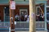 Porch concert protests utility pole placement