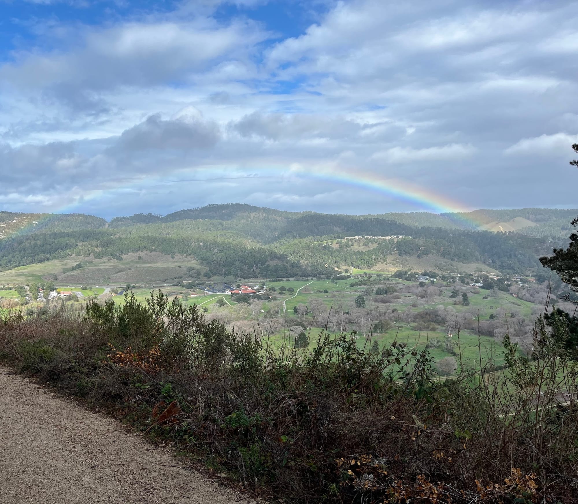 The view from Inspiration Point under a rainbow