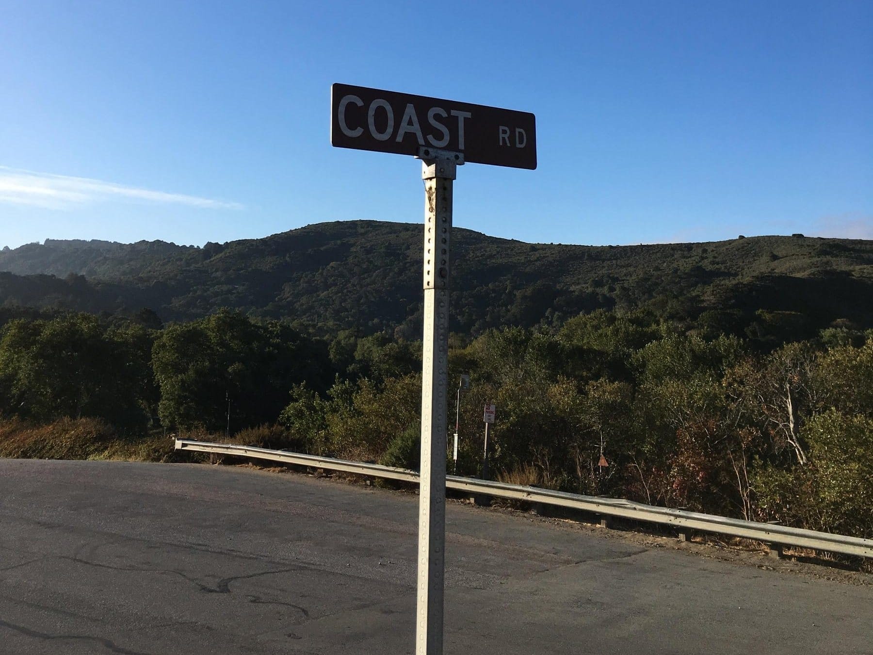 COAST RD sign at the Highway 1 junction near Andrew Molera
