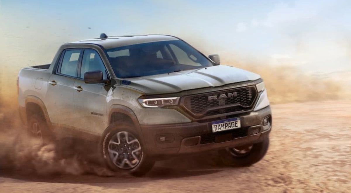 2026 Ram Rampage Rebel compact pickup conquering rugged off-road trail with premium aggressive stance – the unibody beast the US is missing