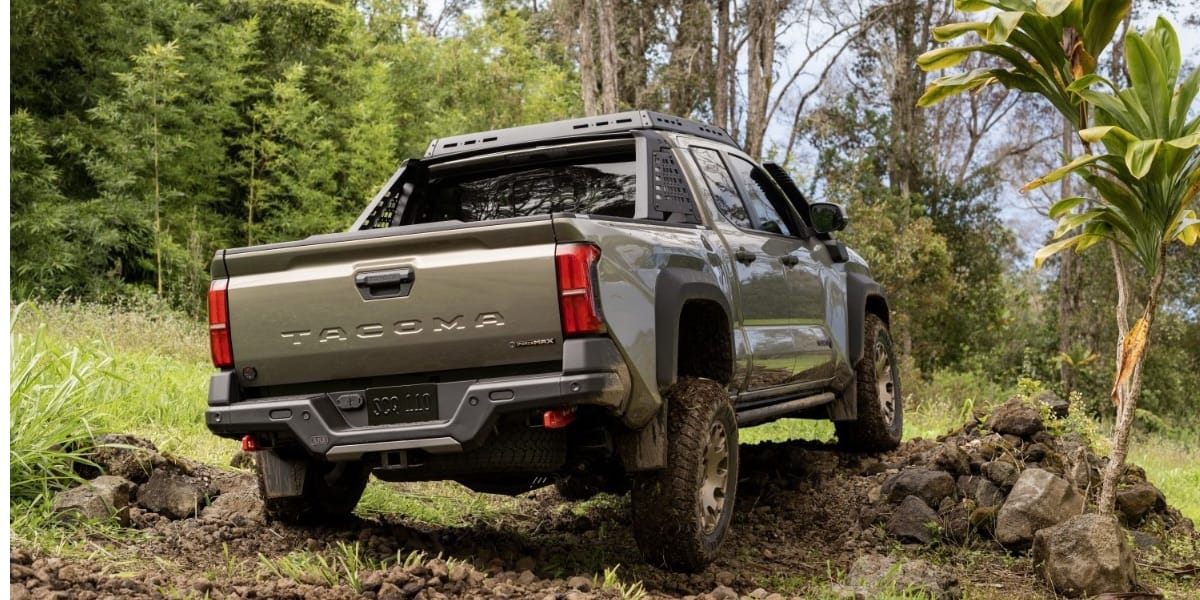 Toyota Tacoma Trailhunter rear quarter rock crawling with wheel articulation