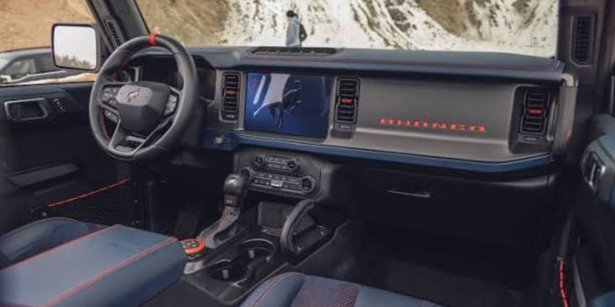 Ford Ranger Raptor Interior with orange accents and large infotainment display