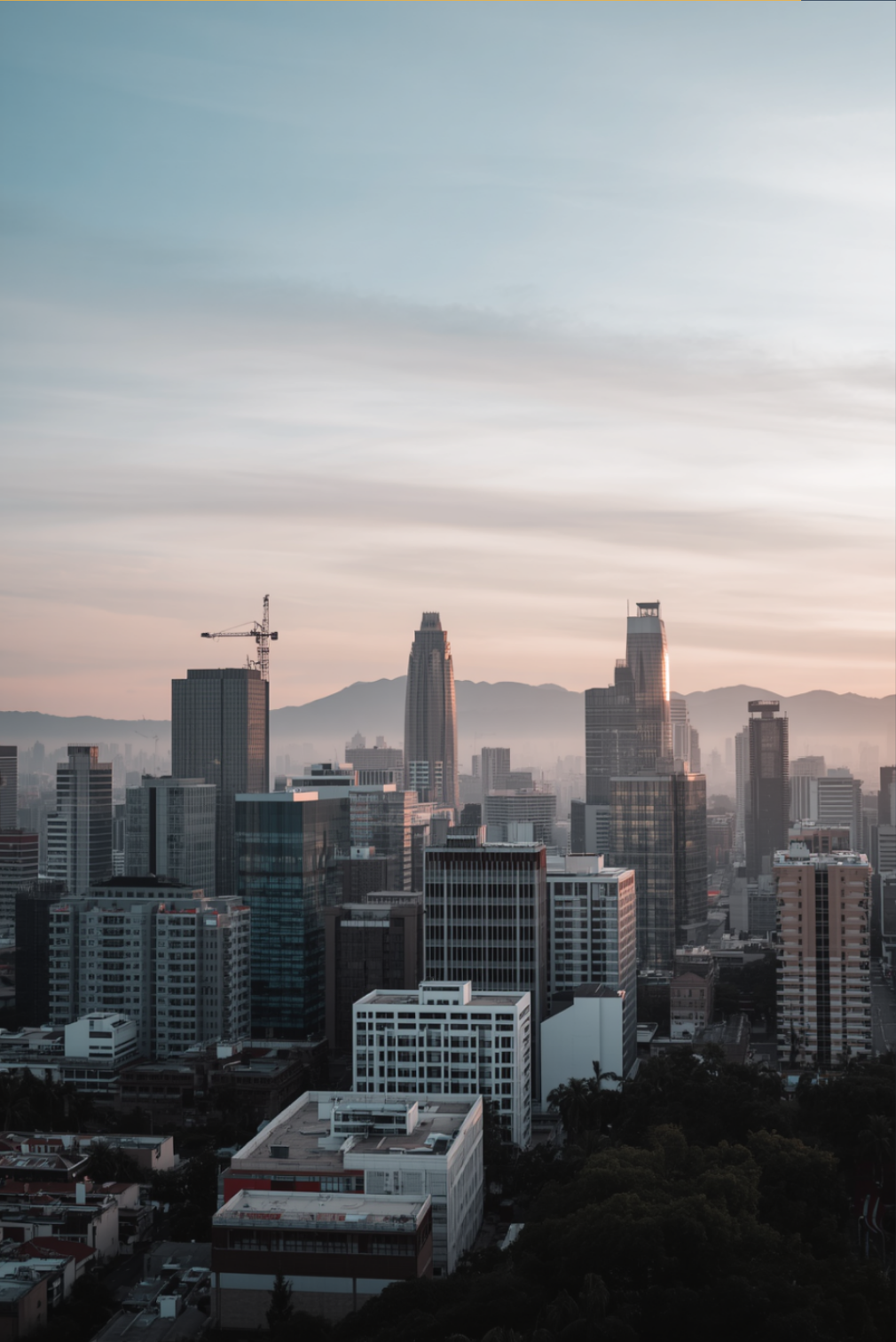Sao Paulo skyline at dusk with mountains in the background, Brazil