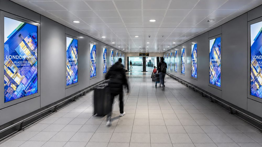 Digital billboard advertising mockup at London Heathrow Airport (LHR), reaching Frieze London 2026 collectors as the first and last impression of their trip.