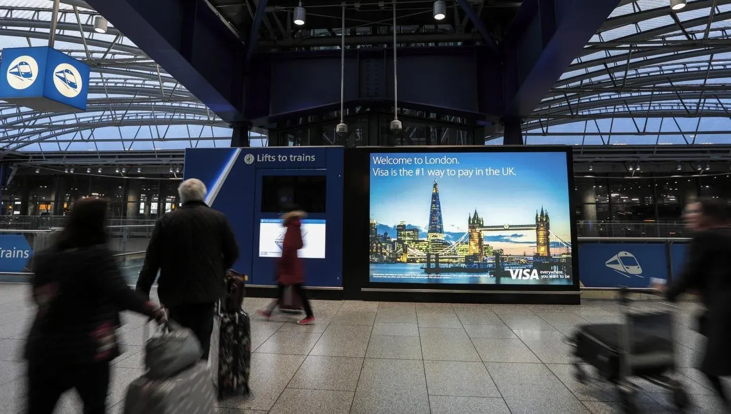 Advertising placement mockup at London Gatwick Airport (LGW), part of the Frieze London 2026 campaign network.