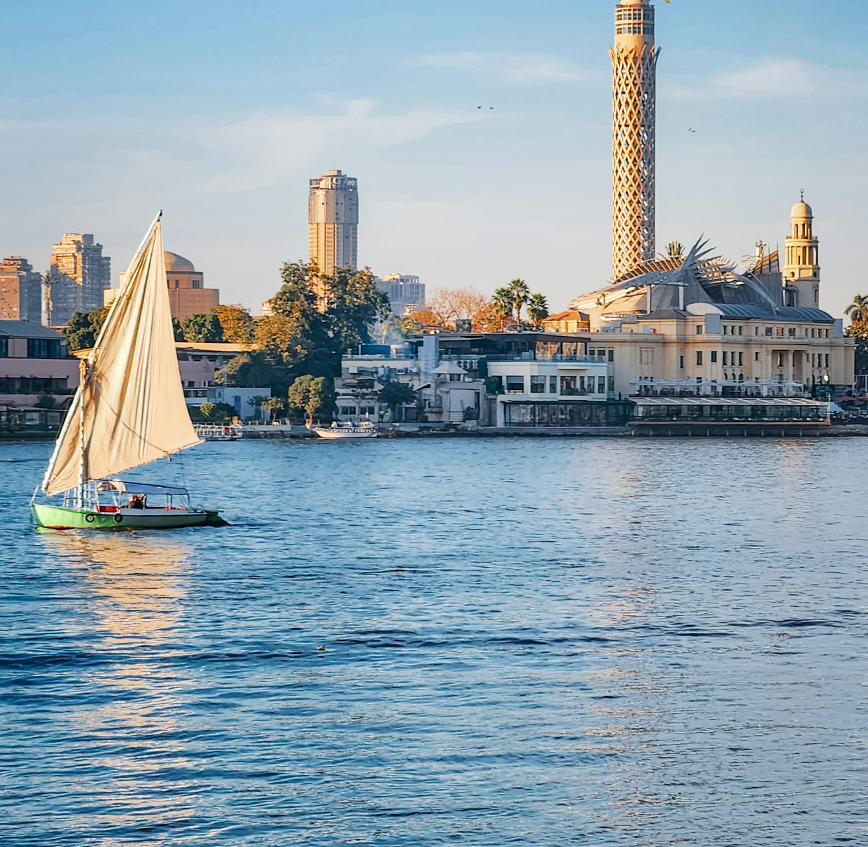 Felucca sailboat on the Nile with Cairo Tower in the background, Cairo, Egypt