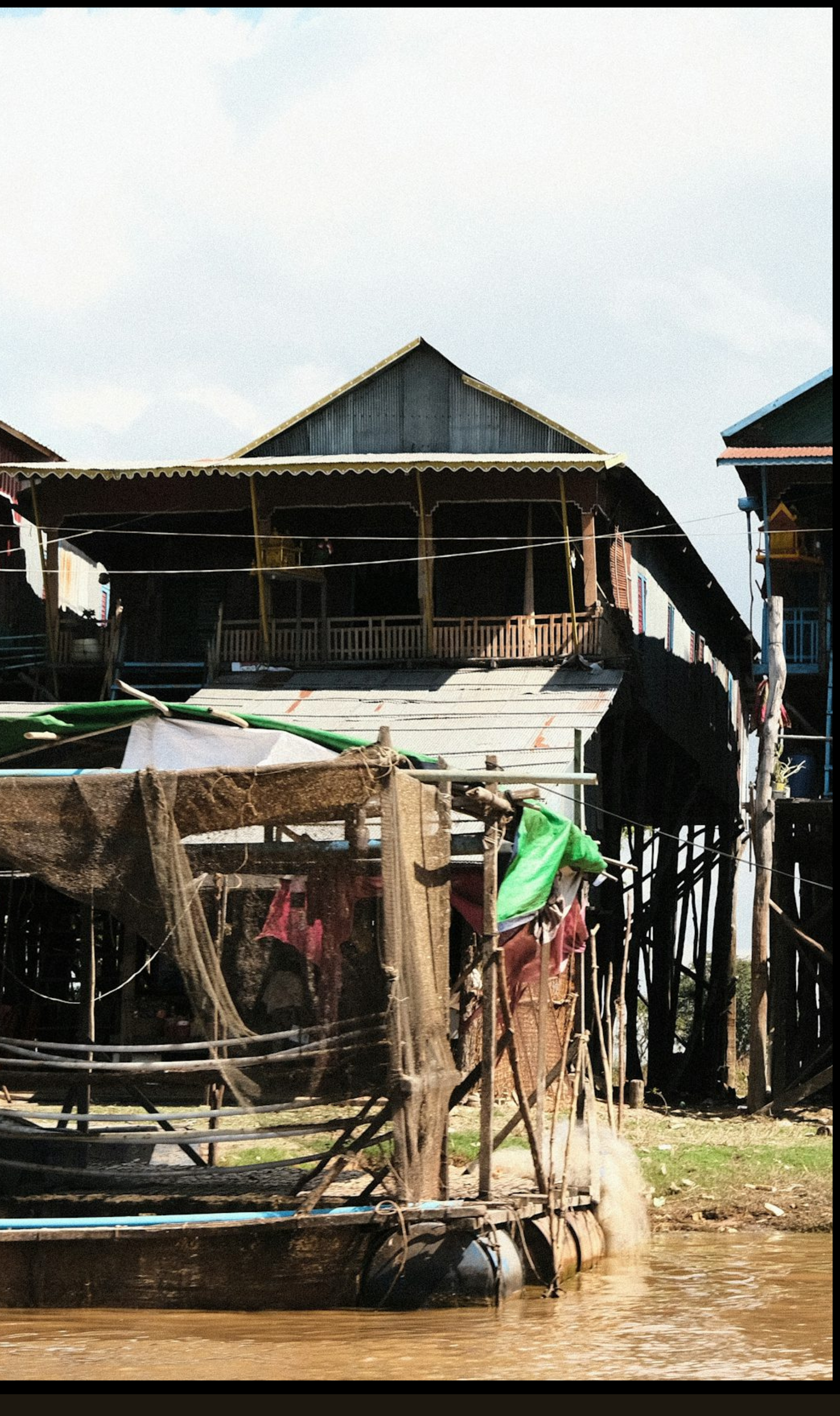 Stilted floating village houses on the Tonle Sap near Siem Reap, Cambodia