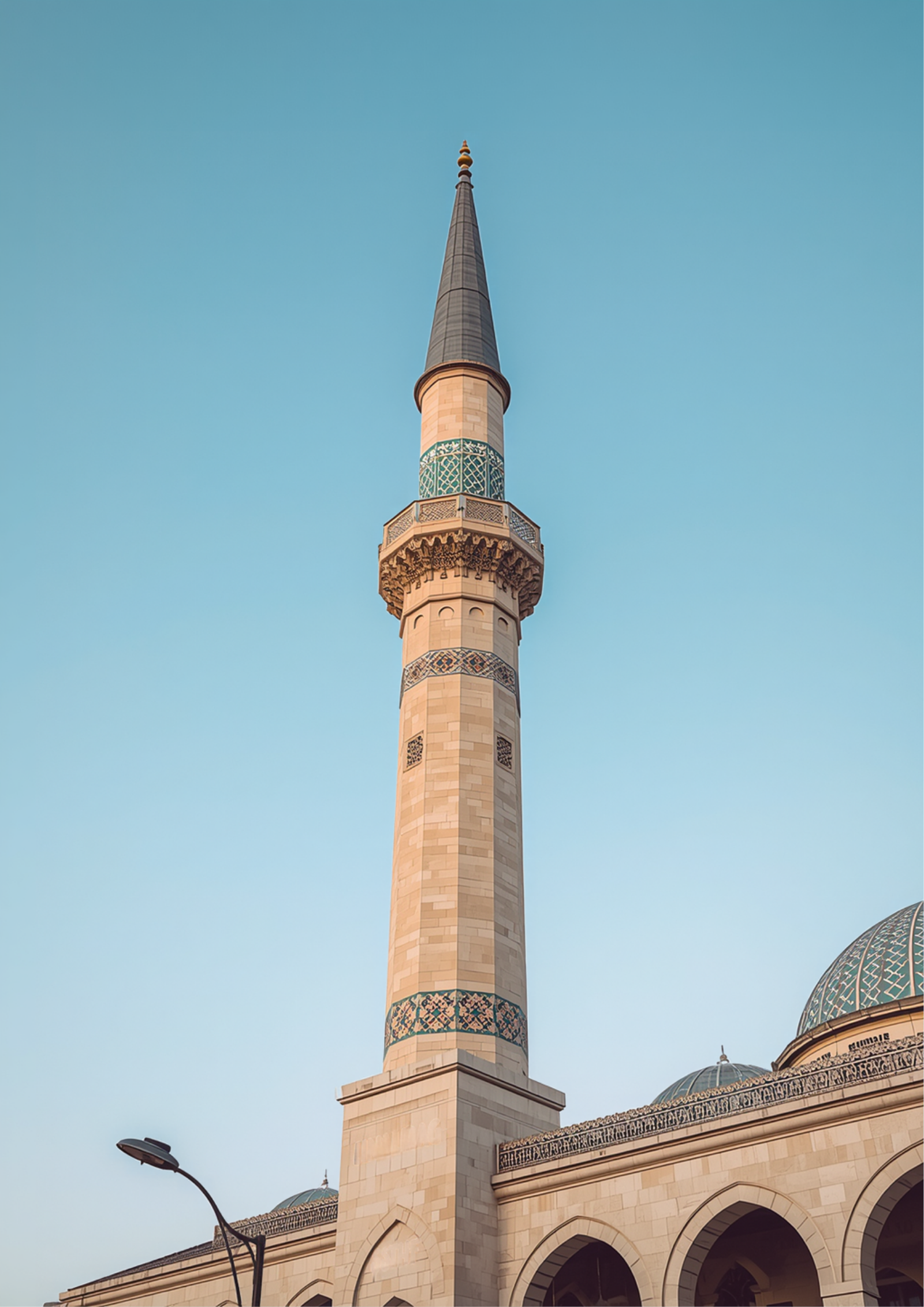 Hassan II Mosque, Casablanca's landmark on the Atlantic coast, minaret rising over the corniche.