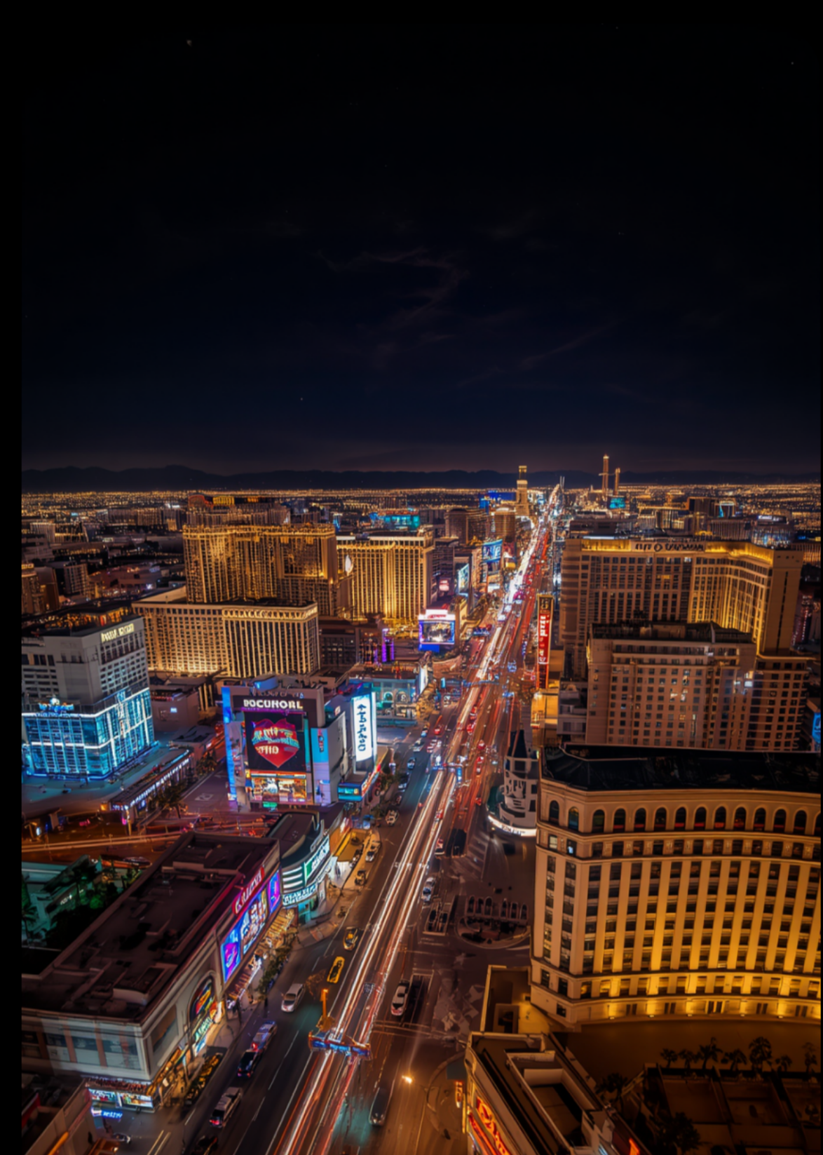Aerial night view of the Las Vegas Strip with light trails, Nevada, USA
