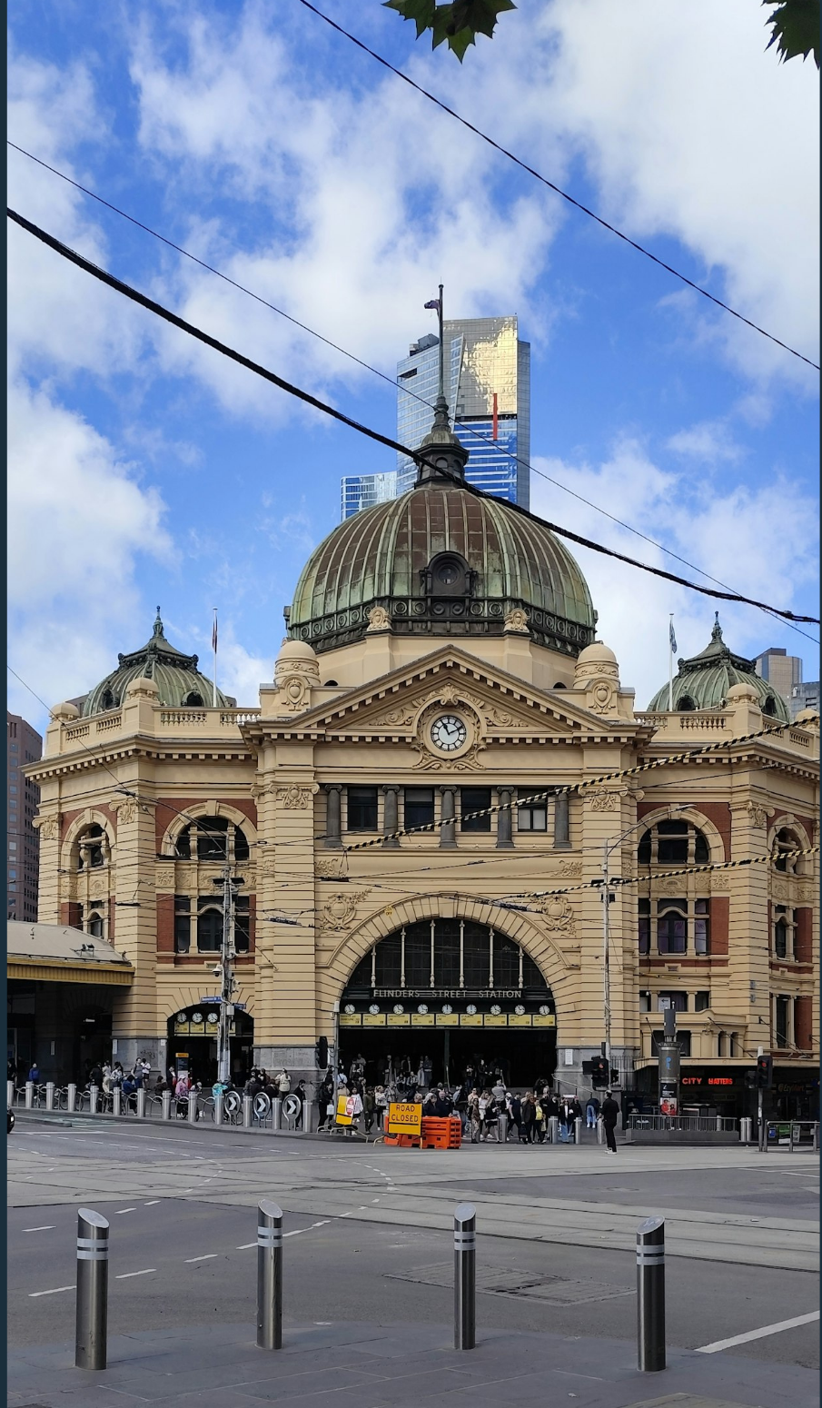 Flinders Street Station with the city skyline behind it, Melbourne, Australia