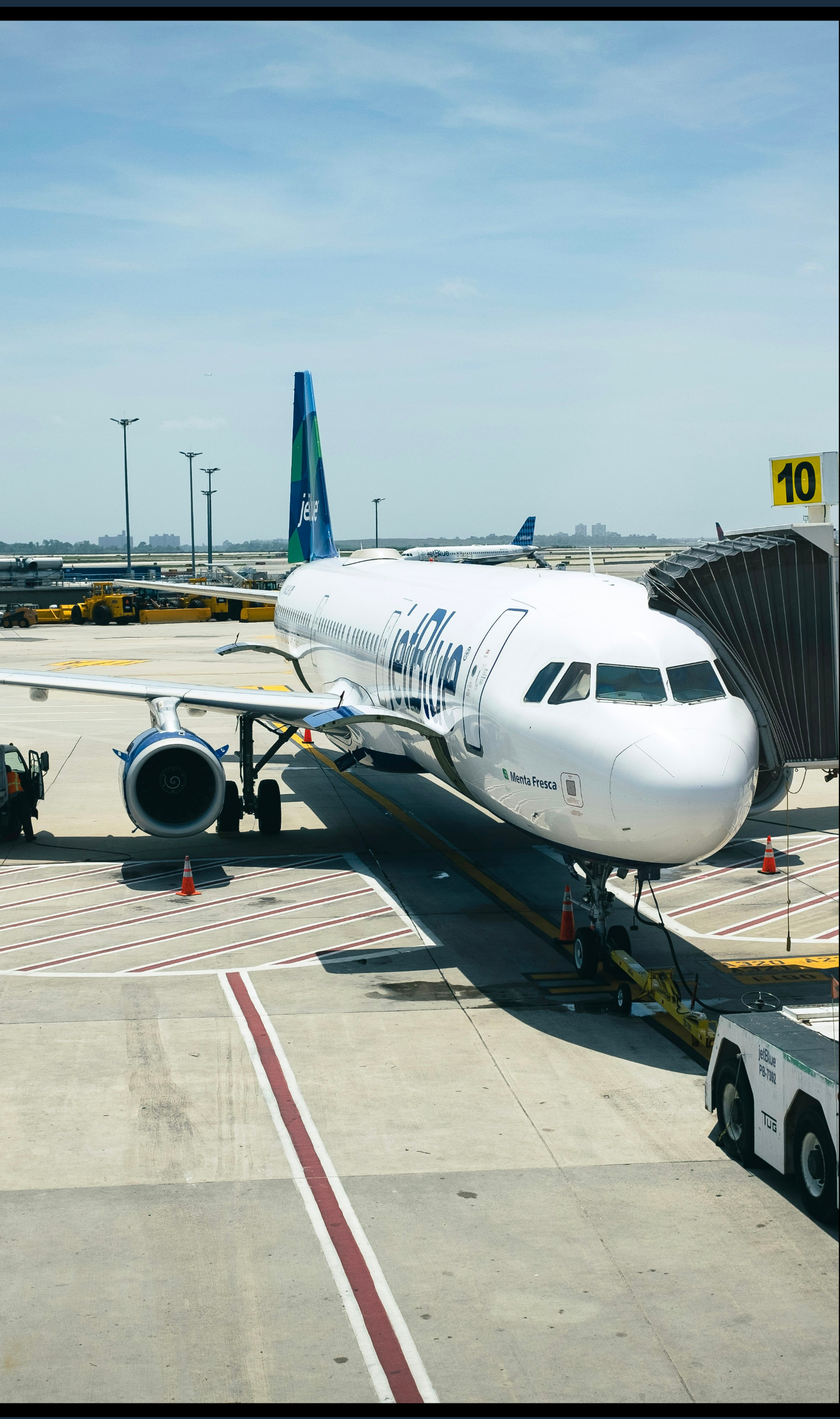 A jetBlue aircraft at the gate at JFK Airport in Queens, New York, USA