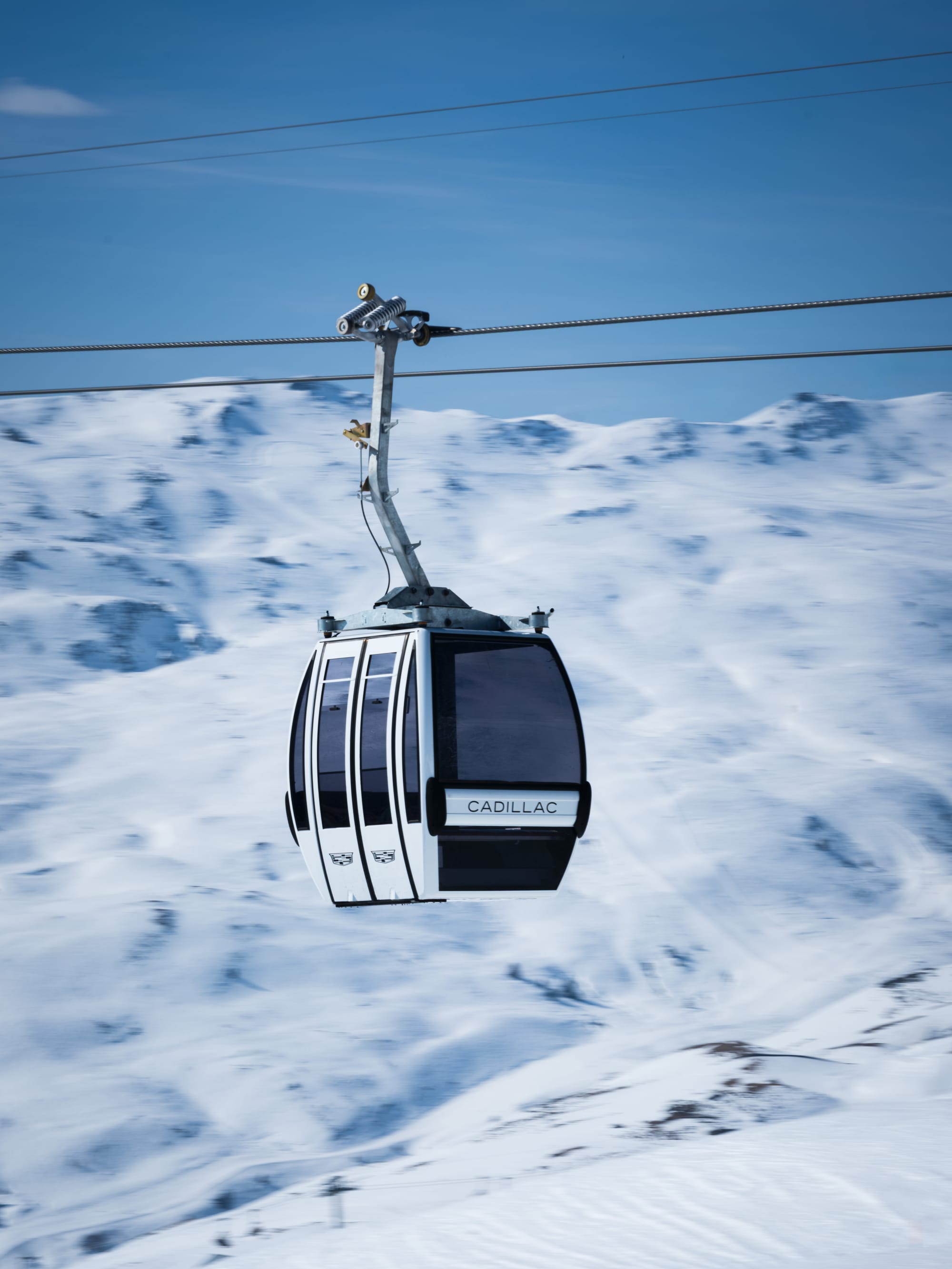 Cadillac branded cabins, billboards and slope signage at Laax