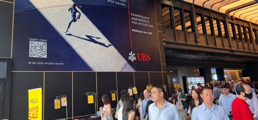 Large-format retail screen in a Singapore shopping area