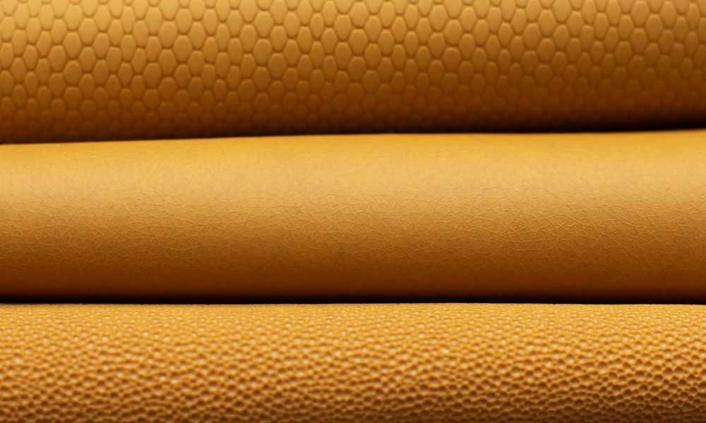 A close-up photo of TômTex's yellow orange biodegradable leather.