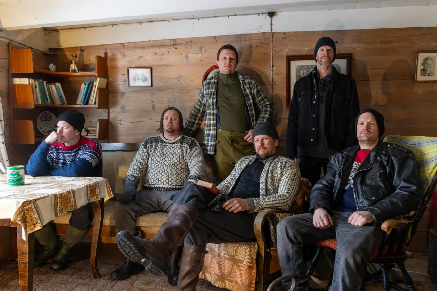 The band warming up in a Cabin.