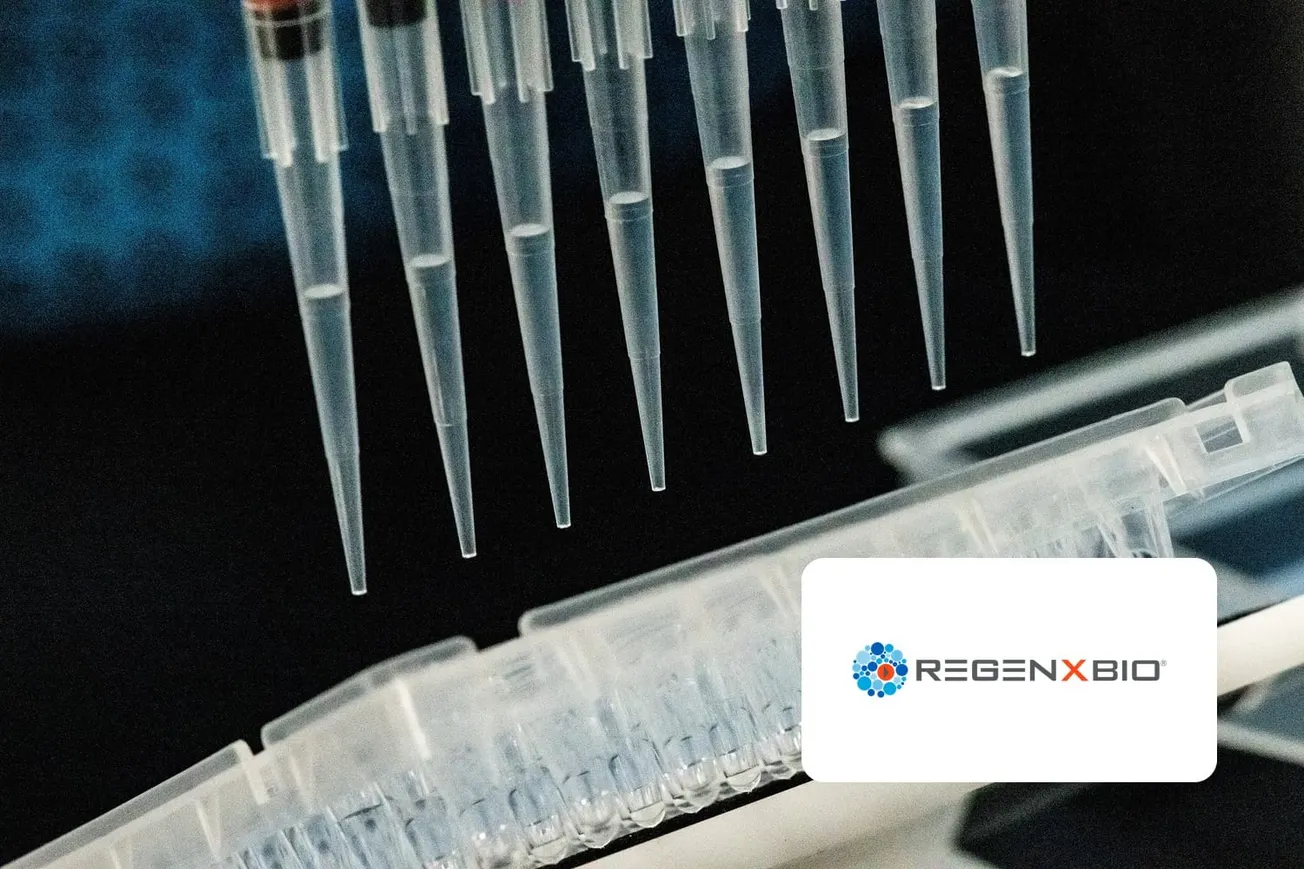 Pipette tips above a sample plate in a laboratory