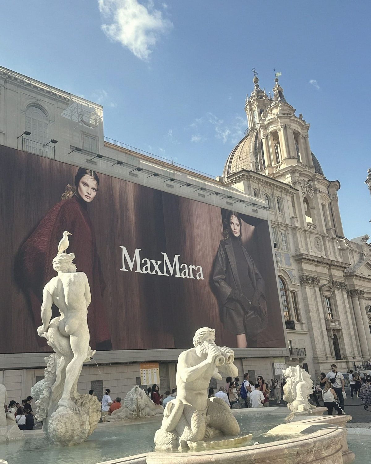 Piazza Navona: MaxMara billboard + gull on the Triton