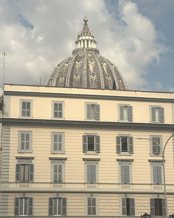 St. Peter's dome over an apartment block