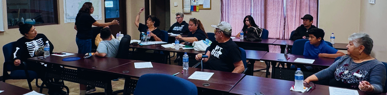 Community members participate in a Mamacítas Cibernéticas focus group in Chamberino, discussing digital literacy and internet access needs in southern Doña Ana County.