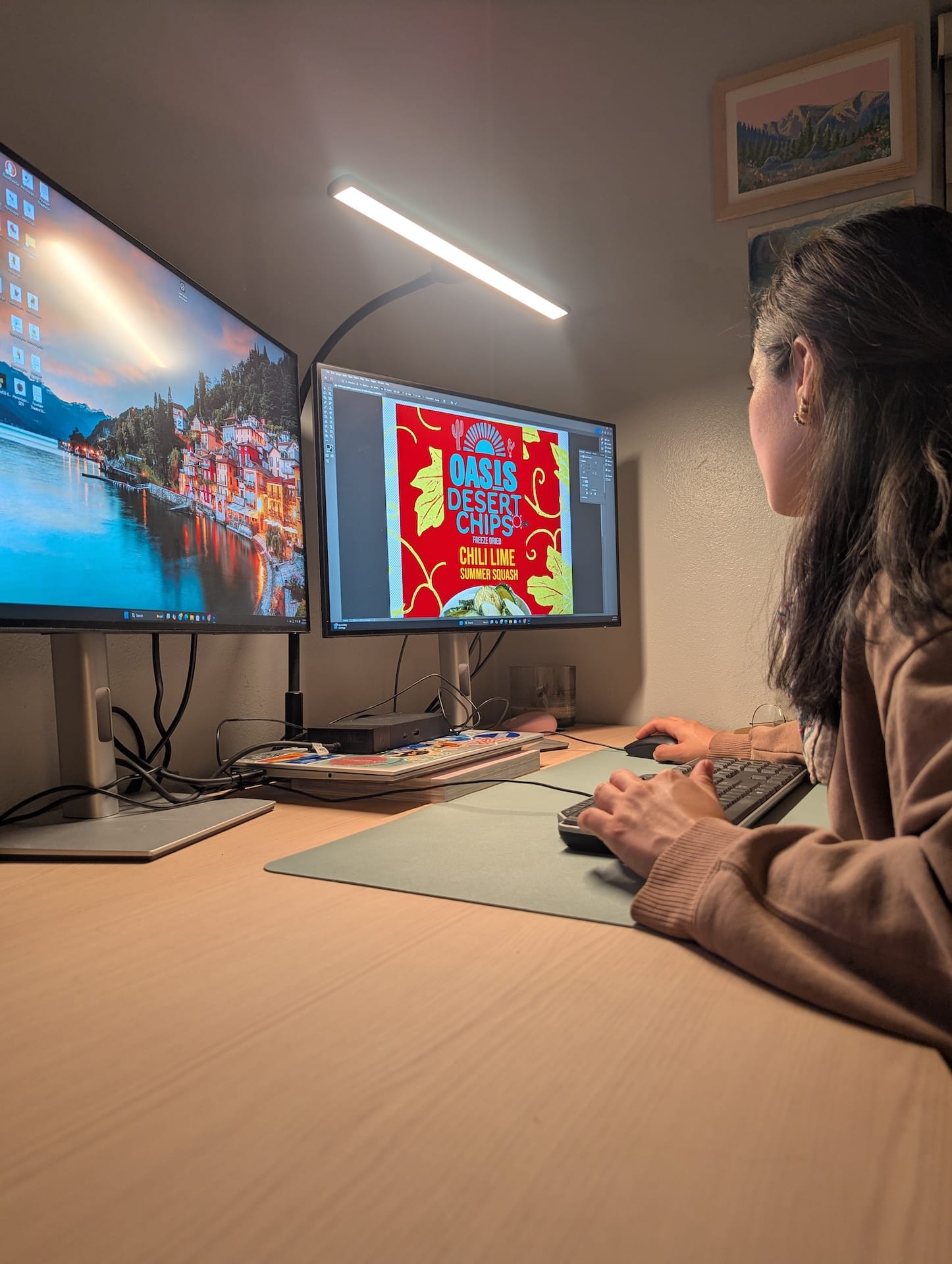 NMSU student Daniela Palacios works on a marketing design project at her computer during her internship with Backyard Farms in Las Cruces, part of the University Center program at Arrowhead Center.