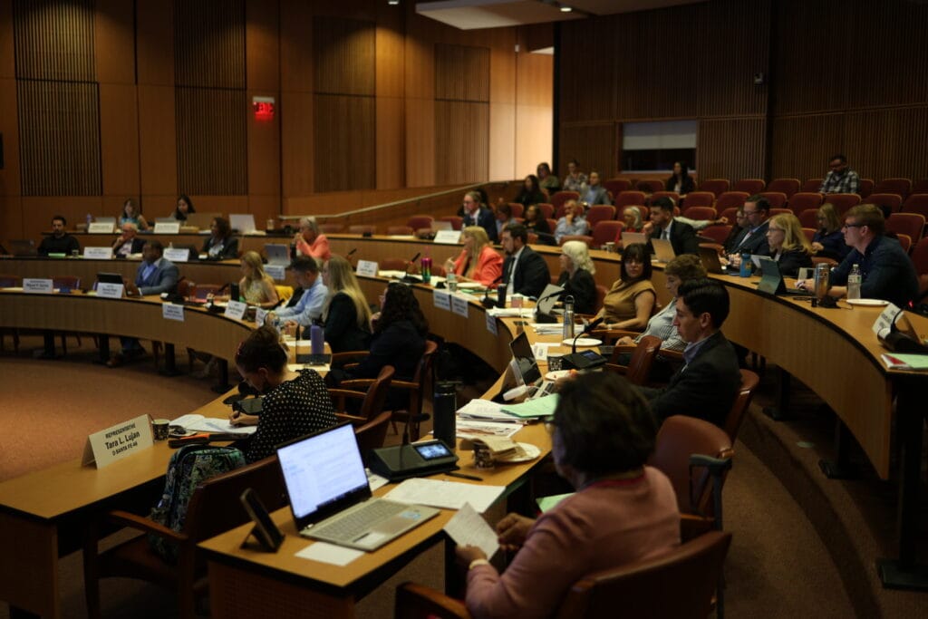 Members of New Mexico’s interim Health and Human Services Committee meet on Oct. 7, 2025, in a hearing room at the Roundhouse in Santa Fe.