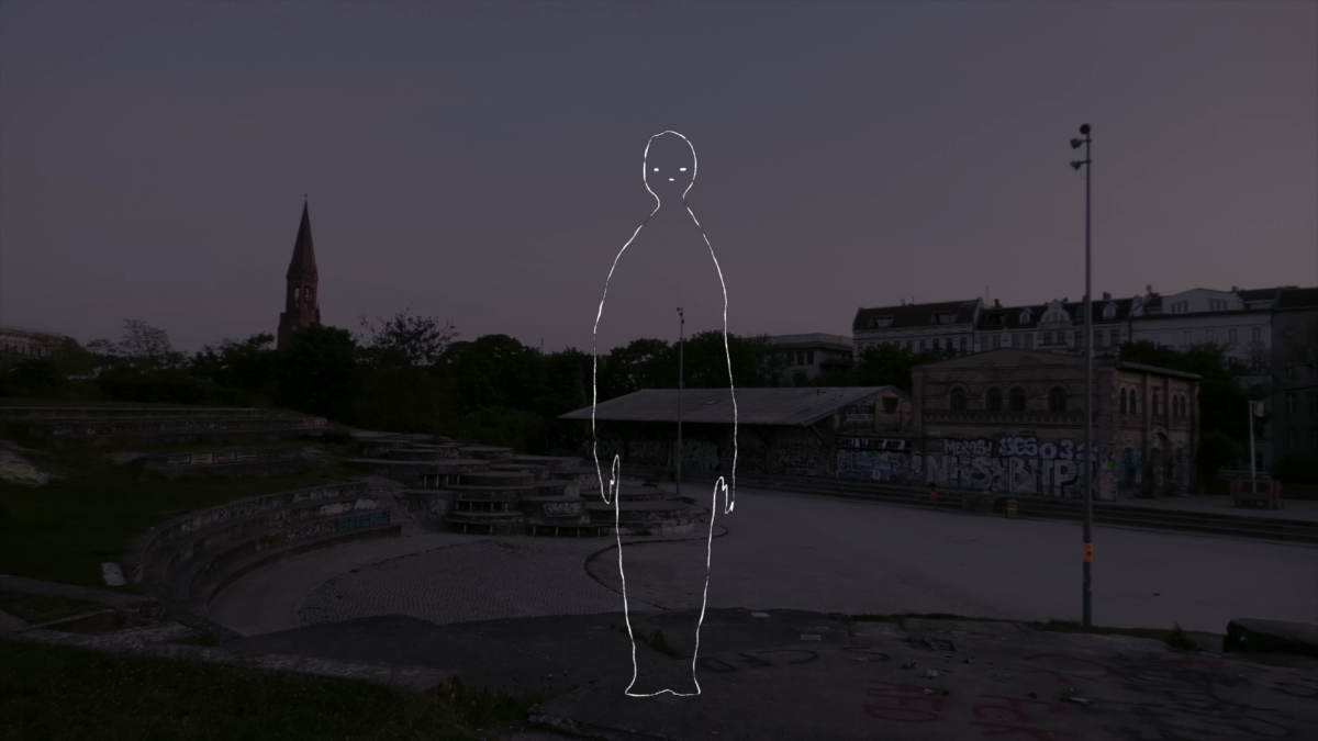 A faint white outline of a human figure appears over a dim urban park at dusk, with graffiti-covered structures and a tall church steeple in the background.