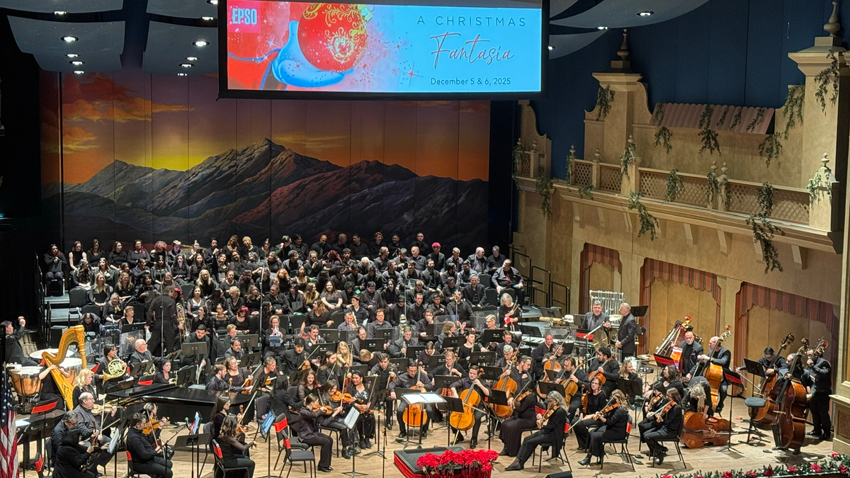 The El Paso Symphony Orchestra and UTEP choral groups perform onstage during the holiday concert A Christmas Fantasia at the Plaza Theatre in El Paso.