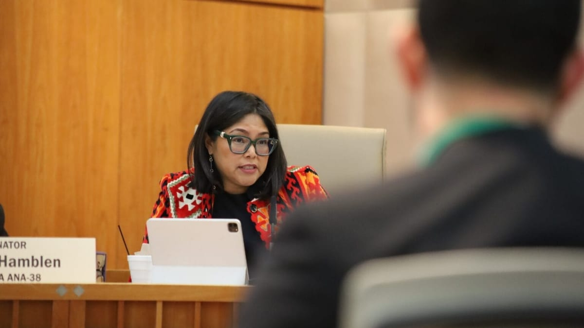 New Mexico Sen. Angel Charley speaks during a legislative committee meeting while seated at a desk with a tablet in front of her at the Roundhouse.